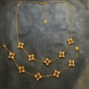Matching Elegant Gold plated Floral Necklace and bracelet